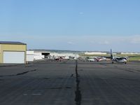 Centennial Airport (APA) - Planes along charlie taxiway - by Victor Agababov