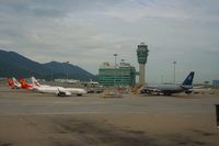 Hong Kong International Airport, Hong Kong Hong Kong (VHHH) - Control tower, 737 from Hong Kong Express and a 747 from United - by Michel Teiten ( www.mablehome.com )