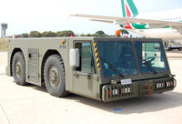 Pratica di Mare Air Force Base - Pushback unit on Pratica di Mare AFB (Italy). - by Jorge Molina