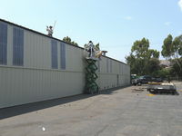 Santa Paula Airport (SZP) - Enclosing open hangars and or adding translucent fiberglass panels - by Doug Robertson