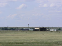 Tucumcari Municipal Airport (TCC) - Tucumcari New Mexico - from I-40 at the posted 75mph! ...I didn't have time to stop! - by Zane Adams