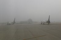 The Eastern Iowa Airport (CID) - Early morning fog and the UPS ramp with two 757s - by Glenn E. Chatfield