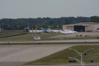 Detroit Metropolitan Wayne County Airport (DTW) - One of the FBOs at DTW with an ex Spirit MD-80 - by Florida Metal