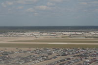 Detroit Metropolitan Wayne County Airport (DTW) - McNamara Terminal seen from landing on 03R at DTW - by Florida Metal