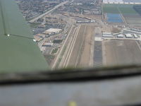 Camarillo Airport (CMA) - Displaced threshold chevron markings to 6,013' Rwy 26. Taken from well overhead runway from Beech 36 BONANZA - by Doug Robertson