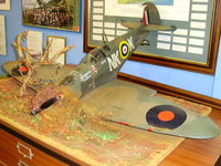 NONE Airport - model of a Spitfire crash site on display at the Fenland & West Norfolk Aviation Museum - by chris hall