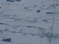 CNC3 Airport - Winter shot of Brampton Airport, ON Canada. Climbing out of Toronto International in an Air Canada A-319 to Kelona BC. - by PeterPasieka