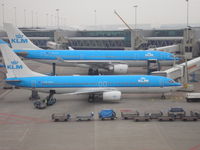 Amsterdam Schiphol Airport, Haarlemmermeer, near Amsterdam Netherlands (EHAM) - KLM: PH-AOA, A330-203 & PH-BXH , B737-8K2 - by Henk Geerlings
