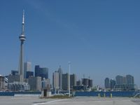 Toronto City Centre Airport, Toronto, Ontario Canada (CYTZ) - Toronto City Centre Airport, Ontario Canada - Open house 2002. View of the CN Tower and the city sky line. - by PeterPasieka