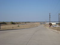 Granbury Regional Airport (GDJ) - Looking up Runway 32 from Howard Clemmons Rd on the South Side. - by Brad Benson N8419R