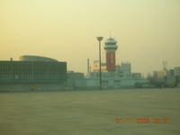 Jinan Yaoqiang Airport, Jinan, Shandong China (ZSJN) - Old Tower and Terminal at Jinan - by John J. Boling