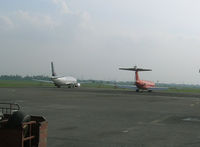 Soekarno-Hatta International Airport, Cengkareng, Banten (near Jakarta) Indonesia (WIII) - Waiting repair at Jakarta - by John J. Boling
