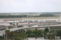 Orlando International Airport (MCO) - Airside 4 with some Delta and Northwest planes - by Florida Metal