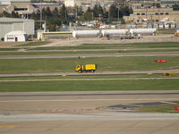 Lambert-st Louis International Airport (STL) - OOPS TRUCK ON RUNWAY - by Gary Schenaman