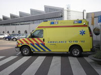 Amsterdam Schiphol Airport, Haarlemmermeer, near Amsterdam Netherlands (EHAM) - Schiphol , Ambulance - by Henk Geerlings