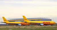 Leipzig/Halle Airport, Leipzig/Halle Germany (EDDP) - Two yellow and red victims of the economic crisis at DHL-HUB LEJ - by Holger Zengler