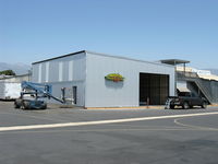 Santa Paula Airport (SZP) - New Hangar Under Construction. Bi-Fold hangar door installed. - by Doug Robertson