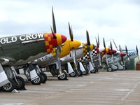 Duxford Airport, Cambridge, England United Kingdom (EGSU) - Nice line-up waiting for the action at the Flying Legends 2009 - by Alex Smit