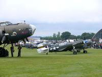 Duxford Airport, Cambridge, England United Kingdom (EGSU) - Nice line-up at the Flying Legends 2009 with two B-17's - by Alex Smit