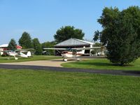 Noblesville Airport (I80) - A pair of Cessna's pulled out for display during the EAA fly-in breakfast - by Bob Simmermon