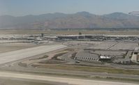 Salt Lake City International Airport (SLC) - Salt Lake City International Airport as seen from my view on departure to OGG. - by Kreg Anderson