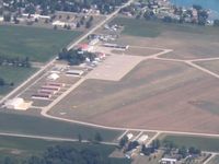 Lenawee County Airport (ADG) - Glider in tow on the grass. - by Bob Simmermon