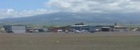 Kahului Airport (OGG) - The helicopter tour area at OGG - by Kreg Anderson