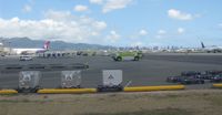 Honolulu International Airport (HNL) - The emergency vehicles lined up along the Ewa Concourse at HNL - by Kreg Anderson