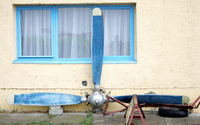 ?csény Airport, ?csény Hungary (LHOY) - The wall of the hangar decorator V-509A-D9 type propeller. - by Attila Groszvald-Groszi