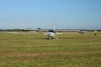 Grimes Field Airport (I74) - Arrivals at MERFI 2009. - by Bob Simmermon