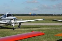 Grimes Field Airport (I74) - BT-13 arriving at the MERFI fly-in. - by Bob Simmermon