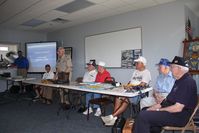 Grimes Field Airport (I74) - Veterans Seminar, John Heilbrun standing, during the MERFI event. - by Bob Simmermon