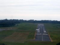 Deauville Saint-Gatien Airport, Deauville France (LFRG) - Short final Rwy 30 with a jet still on it. - by Erdinç Toklu