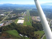 Gatlinburg-pigeon Forge Airport (GKT) - Looking east down RWY 10.  The large concrete ramp is the FBO's new location. - by Bob Simmermon