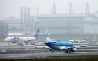 Hamburg Airport, Hamburg Germany (EDDH) - Take off to Amsterdam on pretty wet runway 32 - by Holger Zengler