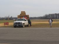 Hardin County Airport (I95) - Mulching hay over completed construction.  Maybe they're just talking about it. - by Bob Simmermon