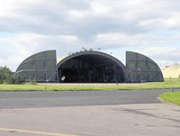RAF Leeming Airport, Leeming Bar, England United Kingdom (EGXE) - Hard aircraft shelter at RAF Leeming, UK. - by Malcolm Clarke
