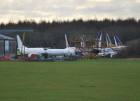 Lasham Airfield Airport, Basingstoke, England United Kingdom (EGHL) - Some of the heavy metal stored at ATC's facility. - by moxy