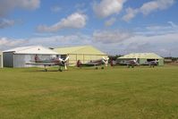 X5FB Airport - The Yakovlevs resting at Fishburn Airfield prior to an aerobatics display at Seaham, County Durham in 2005. - by Malcolm Clarke