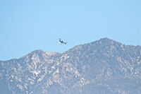 Palm Springs International Airport (PSP) - SkyWest Bombardier CL-600-2C10, on approach to 31L KPSP. - by Mark Kalfas