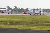 Lakeland Linder Regional Airport (LAL) - Aeroshell Team AT-6's departing RWY 9. - by Bob Simmermon