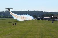 Beach City Airport (2D7) - A little smoke show during Father's Day breakfast fly-in at Beach City, Ohio. - by Bob Simmermon