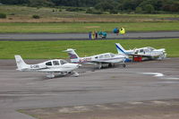 Swansea Airport, Swansea, Wales United Kingdom (EGFH) - Visiting and resident aircraft on the apron. - by Roger Winser