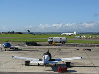 Cardiff International Airport, Cardiff, Wales United Kingdom (EGFF) - View over the GA apron to two Ryder Cup bizjets. - by Roger Winser
