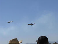Camarillo Airport (CMA) - Formation Flight-two Lockheed P-38 LIGHTNINGS N7723C in lead & N138AM at 2010 Wings Over Camarillo 30th Annual Airshow. (You are seeing about half of the World's airworthy P-38s in one photo) - by Doug Robertson