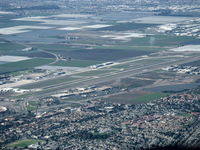 Camarillo Airport (CMA) - Rwy 08-26 taken from RV-7 over city of Camarillo northeast of field looking southwest. Note greatly displaced threshold-Rwy 26. Oxnard eastern city limits at top of photo. Extensive farmland between the cities. - by Doug Robertson