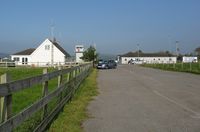 Pembrey Airport, Pembrey, Wales United Kingdom (EGFP) - Pembrey Airport buildings and control tower. - by Roger Winser