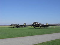 Geneseo Airport (D52) - B-17 The Movie Memphis Belle and C-47 D Day survivor sitting in the grass at Geneseo. - by Terry L. Swann