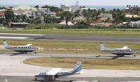 Princess Juliana International Airport, Philipsburg, Sint Maarten Netherlands Antilles (TNCM) - Some small action going on at TNCM - by Daniel Jef