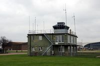 Duxford Airport, Cambridge, England United Kingdom (EGSU) - Controletower.Background left TFC hangar.Right Air Space hangar. - by Robert Roggeman